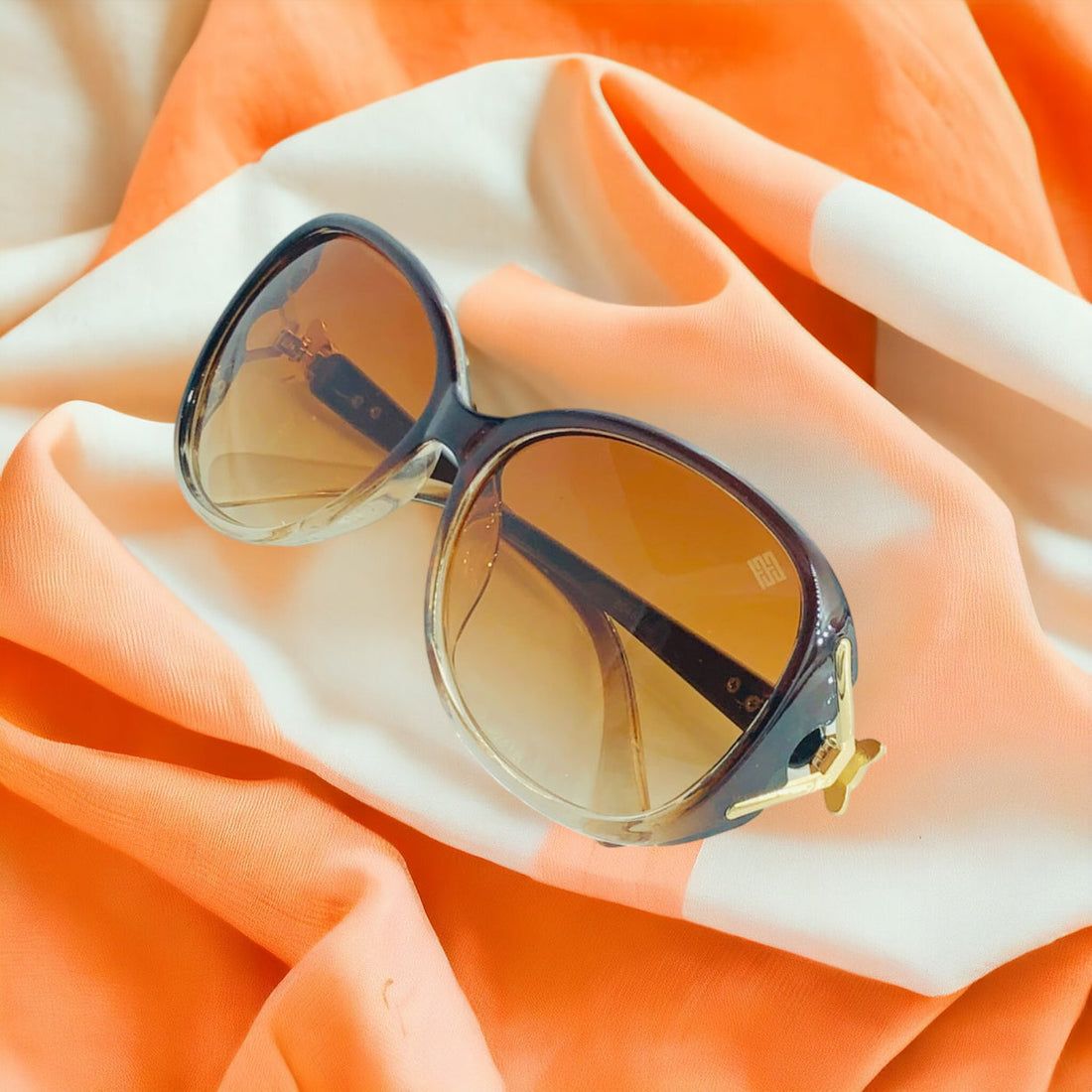 Oval trendy design brown sunglasses for women